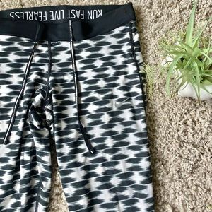 Nike fun patterned dry fit running leggings. Super cozy and comfy. Worn …